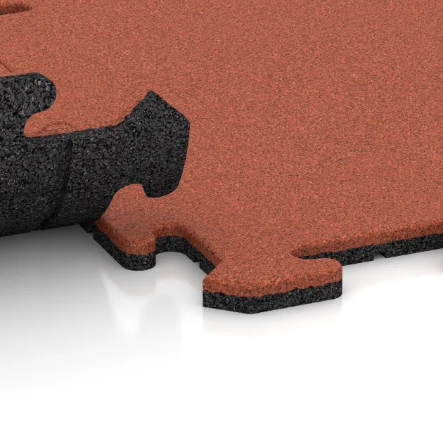 Großaufnahme vom Verbindungssystem von WARCO-Boden 6218 - Sportboden‑Platte 1,8 cm im Farbdesign Hellrot-Orange. Abmessungen 500 x 500 x 18 mm.