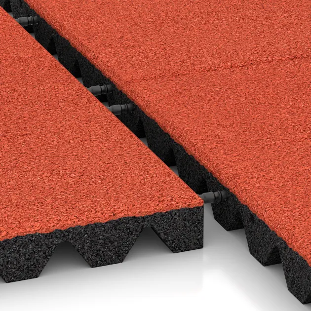 Le gros plan sur le système de connexion des revêtements de sol WARCO 0638 - Dalle amortissante en couleur Rouge-Orange Clair. Les dimensions 500 x 500 x 45 mm.