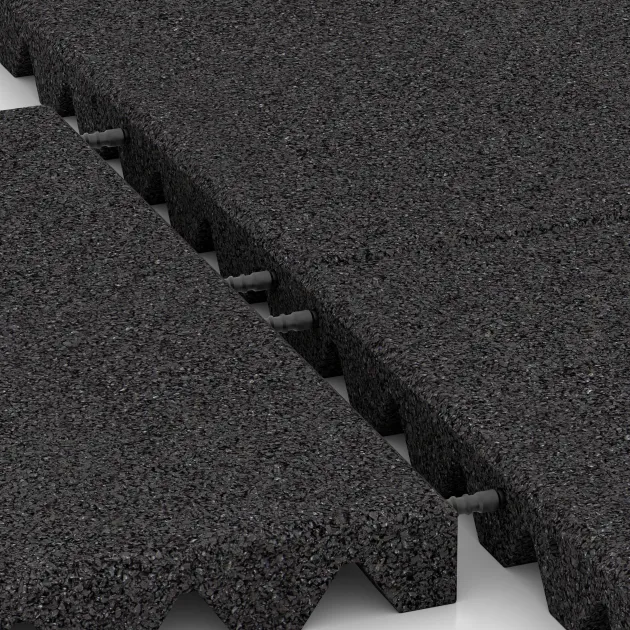 Le gros plan sur le système de connexion des revêtements de sol WARCO 0660 - Dalle amortissante en couleur Anthracite. Les dimensions 500 x 500 x 45 mm.