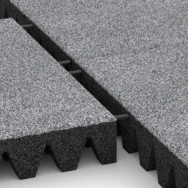 Le gros plan sur le système de connexion des revêtements de sol WARCO 5376 - Dalle amortissante en couleur Gris mélange. Les dimensions 500 x 500 x 80 mm.