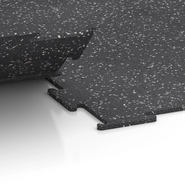 Großaufnahme vom Verbindungssystem von WARCO-Boden 6452 - Fitnessvloer Compact im Farbdesign Licht Grijs Gespeckeld. Abmessungen 100 × 100 × 0,8 cm.