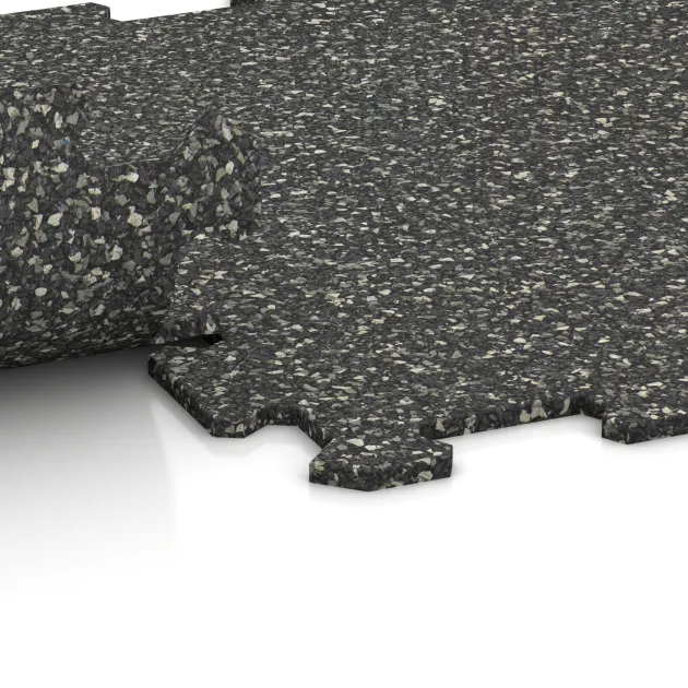 Großaufnahme vom Verbindungssystem von WARCO-Boden 0882 - Fitnessvloer Compact im Farbdesign Donkergrijs Graniet. Abmessungen 485 x 485 x 8 mm.