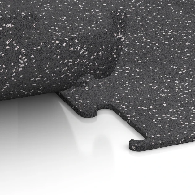 Le gros plan sur le système de connexion des revêtements de sol WARCO 3779 - Revêtement sportif Fitness Performance Elite en couleur Gris doux moucheté. Les dimensions 50 x 50 x 1 cm | 0,25 m².