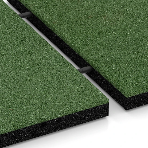 Großaufnahme vom Verbindungssystem von WARCO-Boden 6195 - Rubberen speelplaatstegels im Farbdesign Grasgroen. Abmessungen 50 x 50 x 4 cm.
