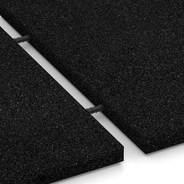 Großaufnahme vom Verbindungssystem von WARCO-Boden 6240 - Rubberen speelplaatstegel – 110 cm im Farbdesign Antraciet. Abmessungen 50 x 50 x 3 cm.