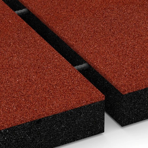 Großaufnahme vom Verbindungssystem von WARCO-Boden 6272 - Rubberen speelplaatstegel – 230 cm im Farbdesign Baksteenrood. Abmessungen 50 x 50 x 8 cm.