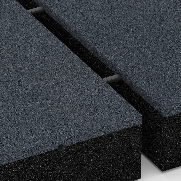 Großaufnahme vom Verbindungssystem von WARCO-Boden 6230 - Rubberen speelplaatstegels im Farbdesign Leisteengrijs. Abmessungen 50 x 50 x 11 cm.