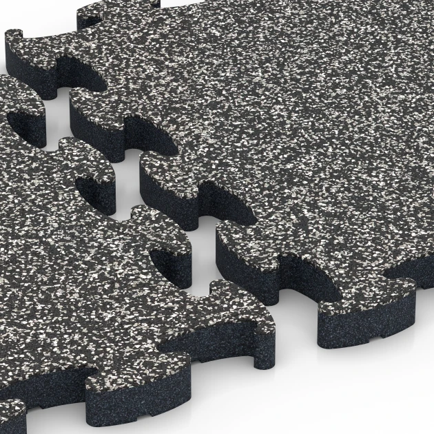Großaufnahme vom Verbindungssystem von WARCO-Boden 6877 - Fitness Max vloersysteem im Farbdesign Donkergrijs graniet. Abmessungen 44,6 x 44,6 × 2,8 cm.